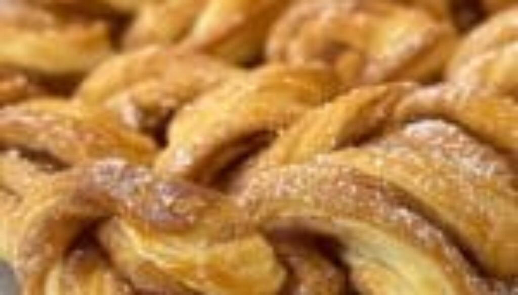 inesboulila_A_batch_of_Warm_Cinnamon_Crescent_Twists_golden_bro_39225931-a3e5-40a2-9924-82b876bade07.jpeg